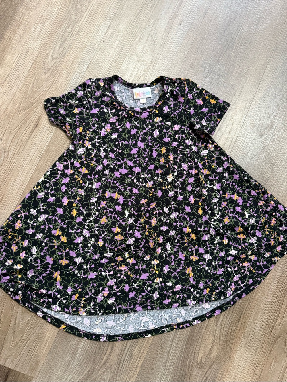 LuLaRoe Black Short Sleeve Floral Swing Tee - Purple & Yellow Flowers